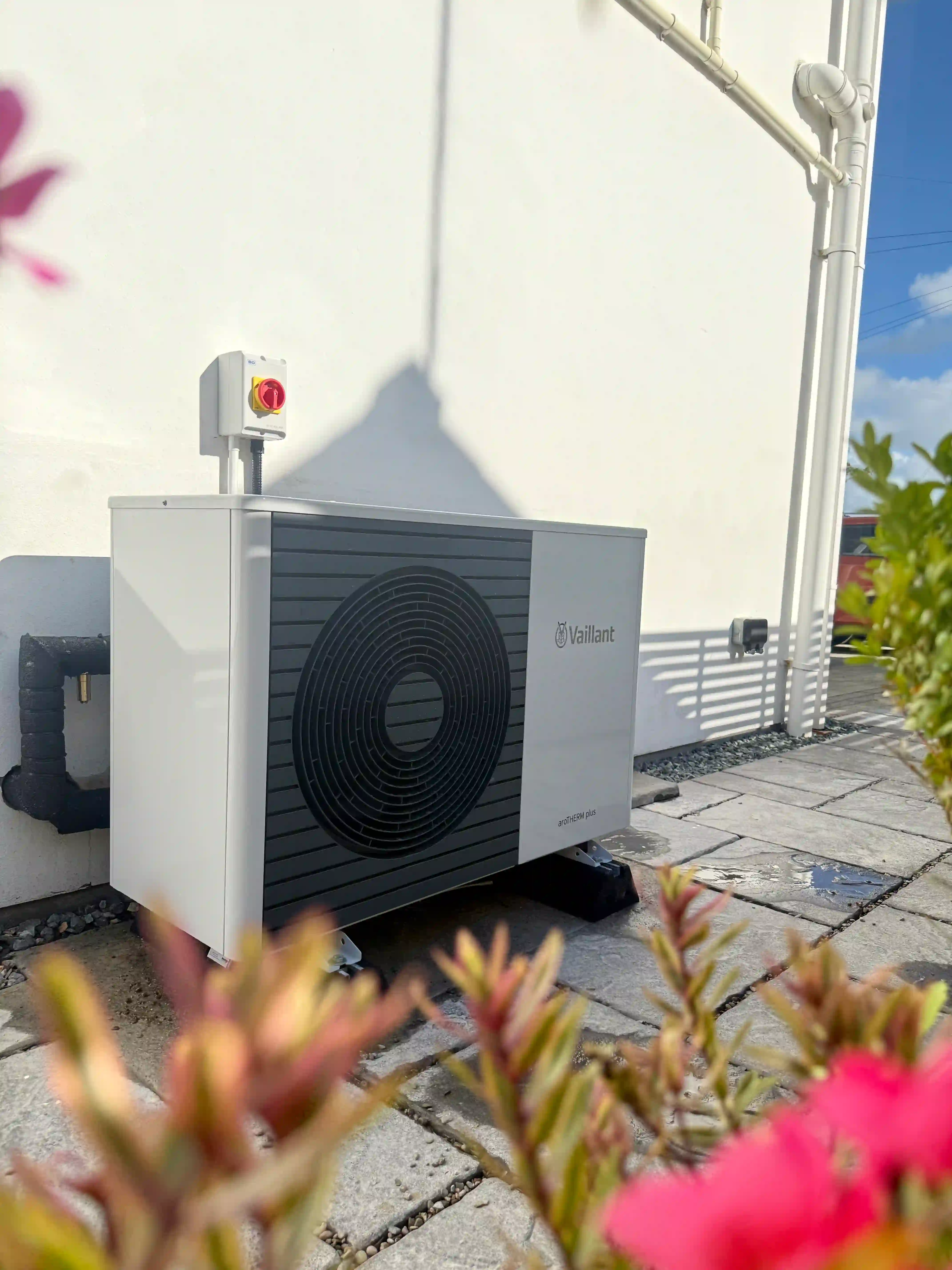 Vaillant aroTHERM Plus air source heat pump outdoor unit at a West Wales home
