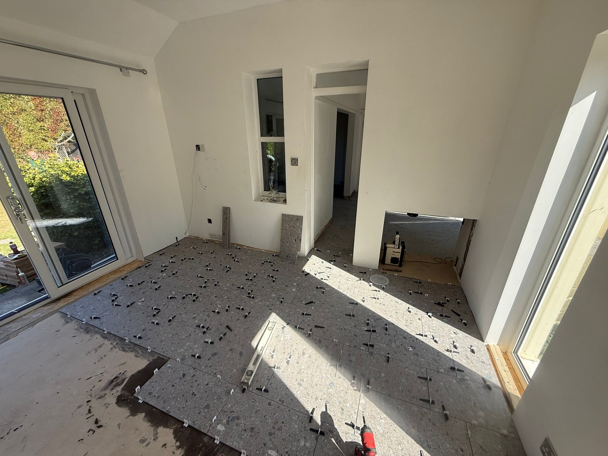 Low-profile underfloor heating retrofit suitable for renovations and stone cottages