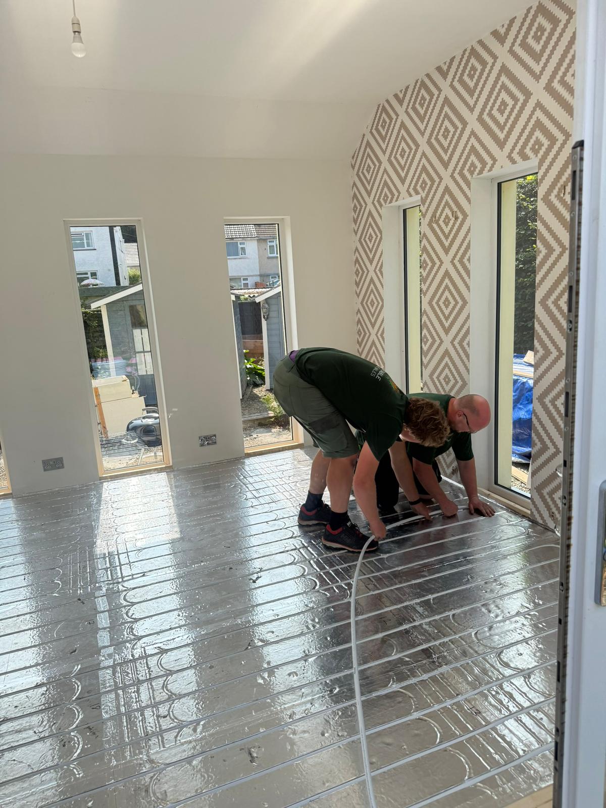 Low-profile underfloor heating retrofit suitable for renovations and stone cottages