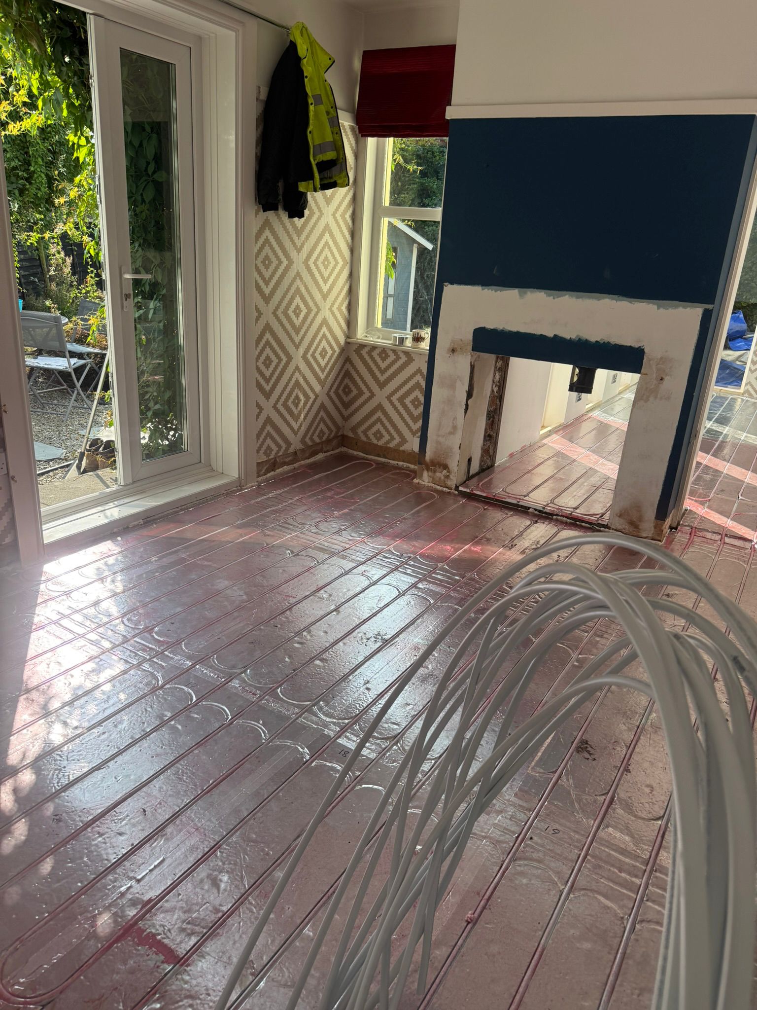 Low-profile underfloor heating retrofit suitable for renovations and stone cottages