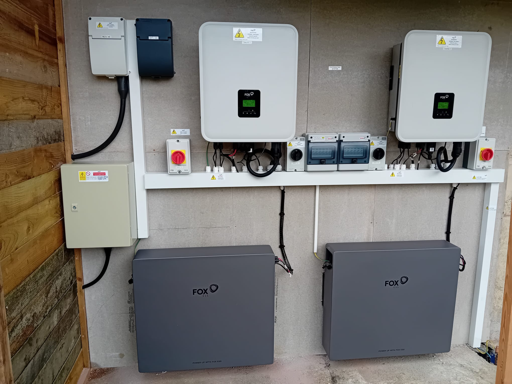 Fox ESS home battery storage cabinet wall-mounted in a utility room